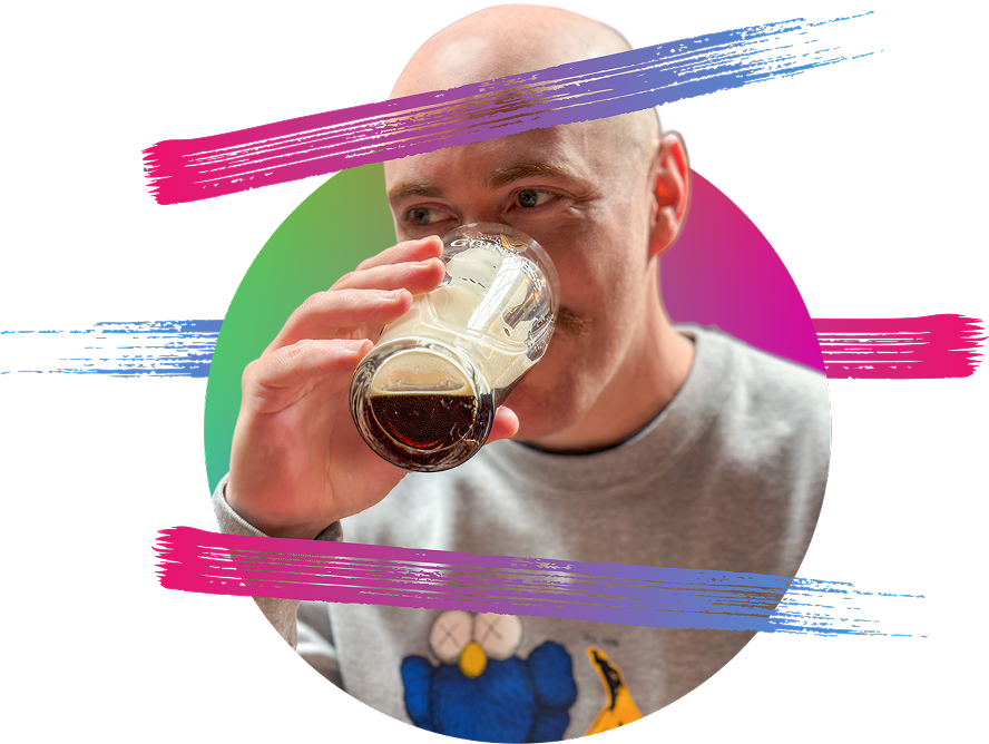 Picture of Lee Baillie drinking a pint of Guinness, stylized with coloured paint streaks.